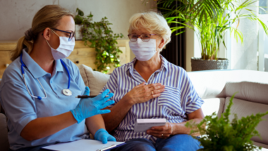 Healthcare worker and patient having a discussion