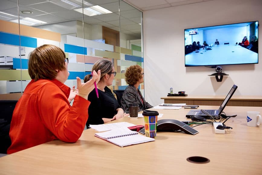 Two teams collaborating over video link